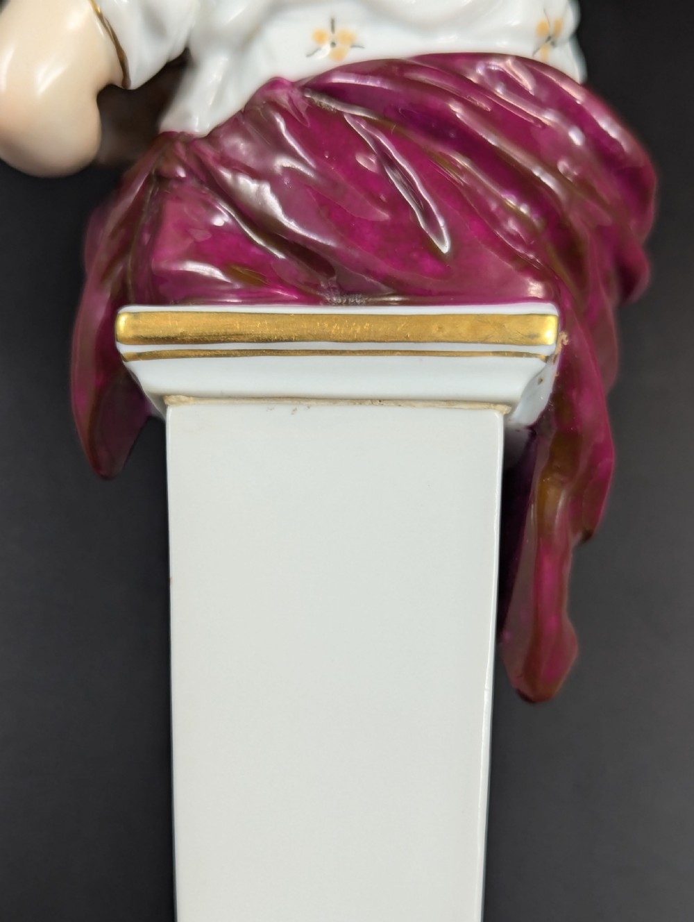 A set of four 19th-century glazed Italian porcelain figurines depicting allegorical female figures representing the arts atop gilded square pedestals. View XI