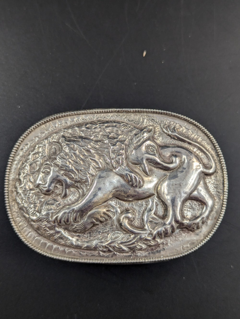 Antique Silver Snuff Box Depicting a Battle Between a Lion and a Mythological Beast