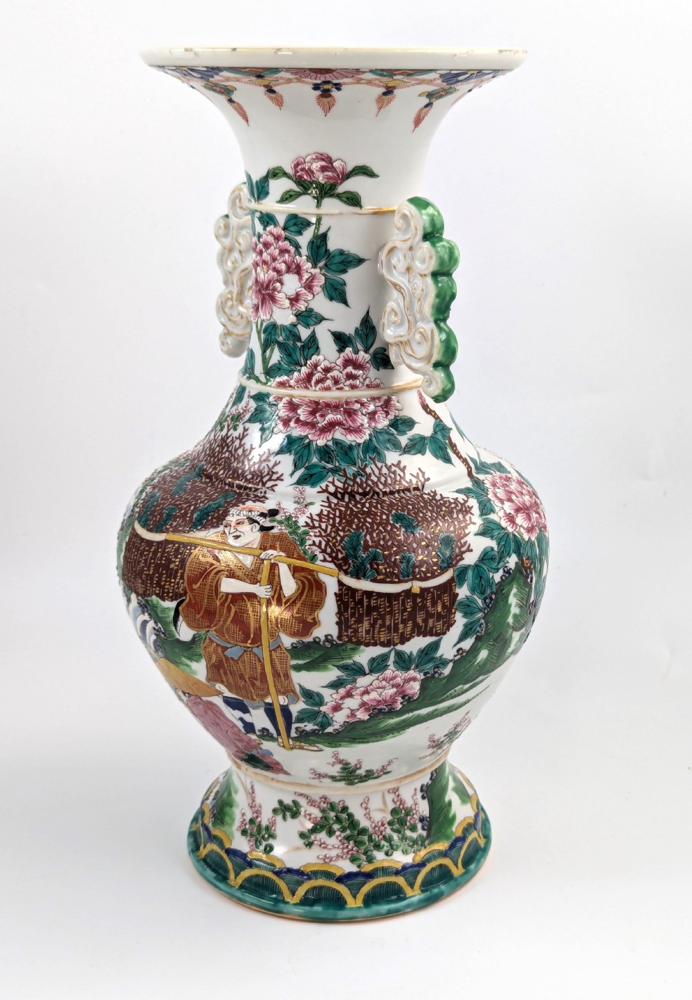 A 19th-century Japanese Kyoto Satsuma porcelain vase featuring scroll handles, a flared rim, and detailed polychrome enamel depictions of human figures and peony blossoms. View II