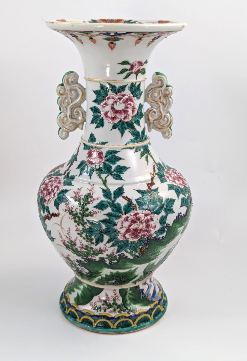 A 19th-century Japanese Kyoto Satsuma porcelain vase featuring scroll handles, a flared rim, and detailed polychrome enamel depictions of human figures and peony blossoms. View IV