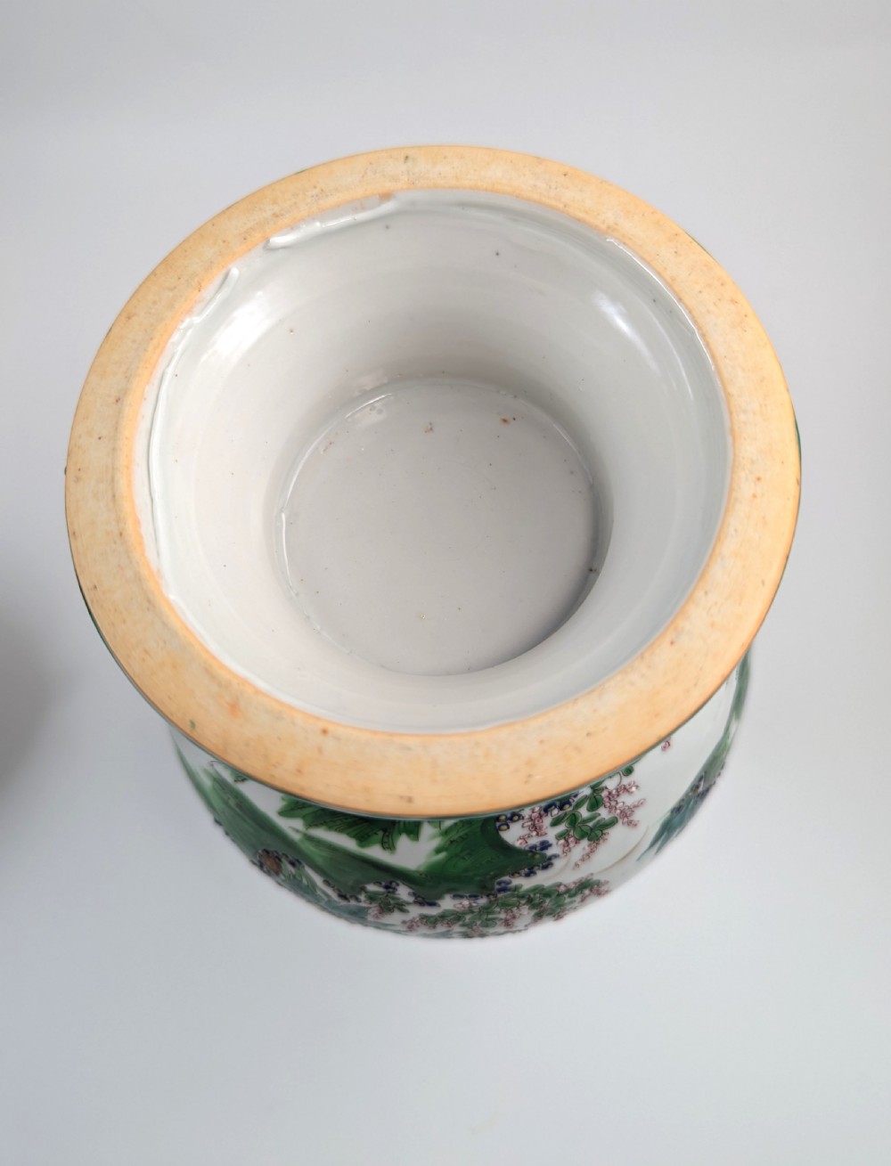 A 19th-century Japanese Kyoto Satsuma porcelain vase featuring scroll handles, a flared rim, and detailed polychrome enamel depictions of human figures and peony blossoms. View IX