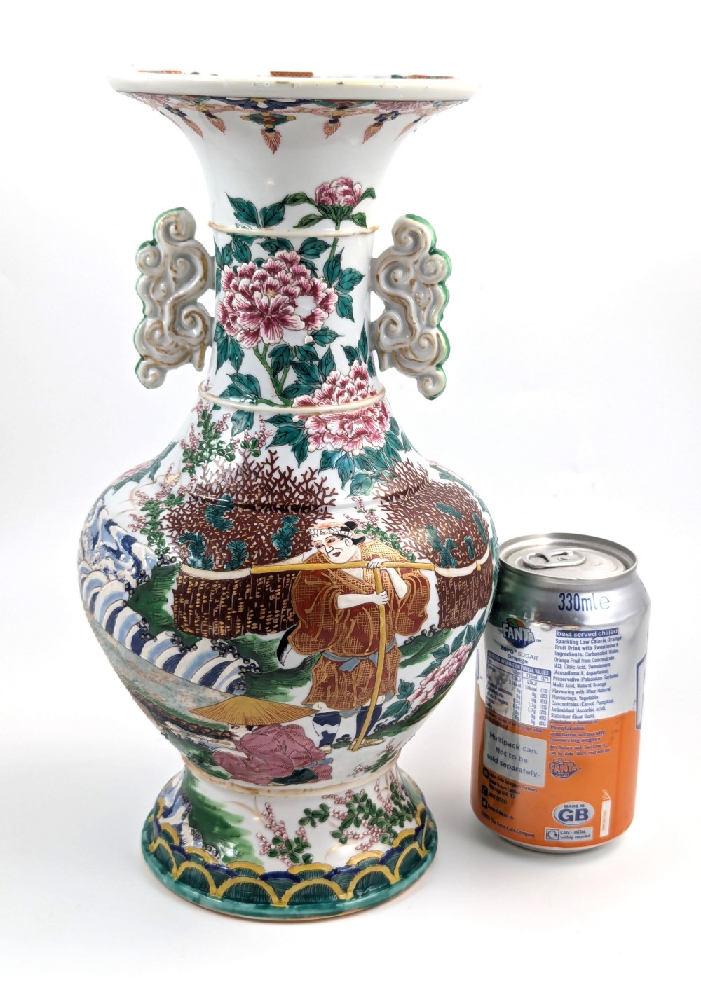 A 19th-century Japanese Kyoto Satsuma porcelain vase featuring scroll handles, a flared rim, and detailed polychrome enamel depictions of human figures and peony blossoms. View XII