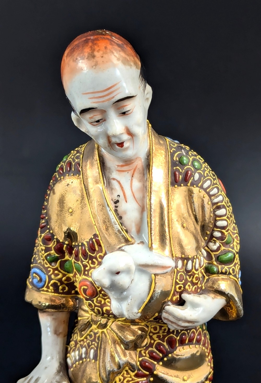 Antique Japanese Satsuma Porcelain Figurine Man with Rabbits, Meiji period (1868 -1912). View VI