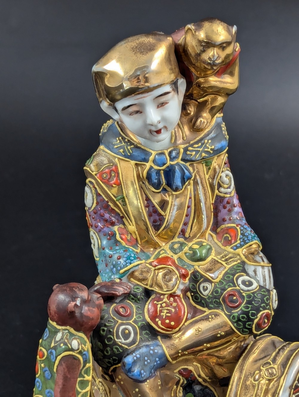 Antique Porcelain Figurine ‘Boy with Monkeys’ by Satsuma, Japan, Meiji period (1868 -1912). View VII