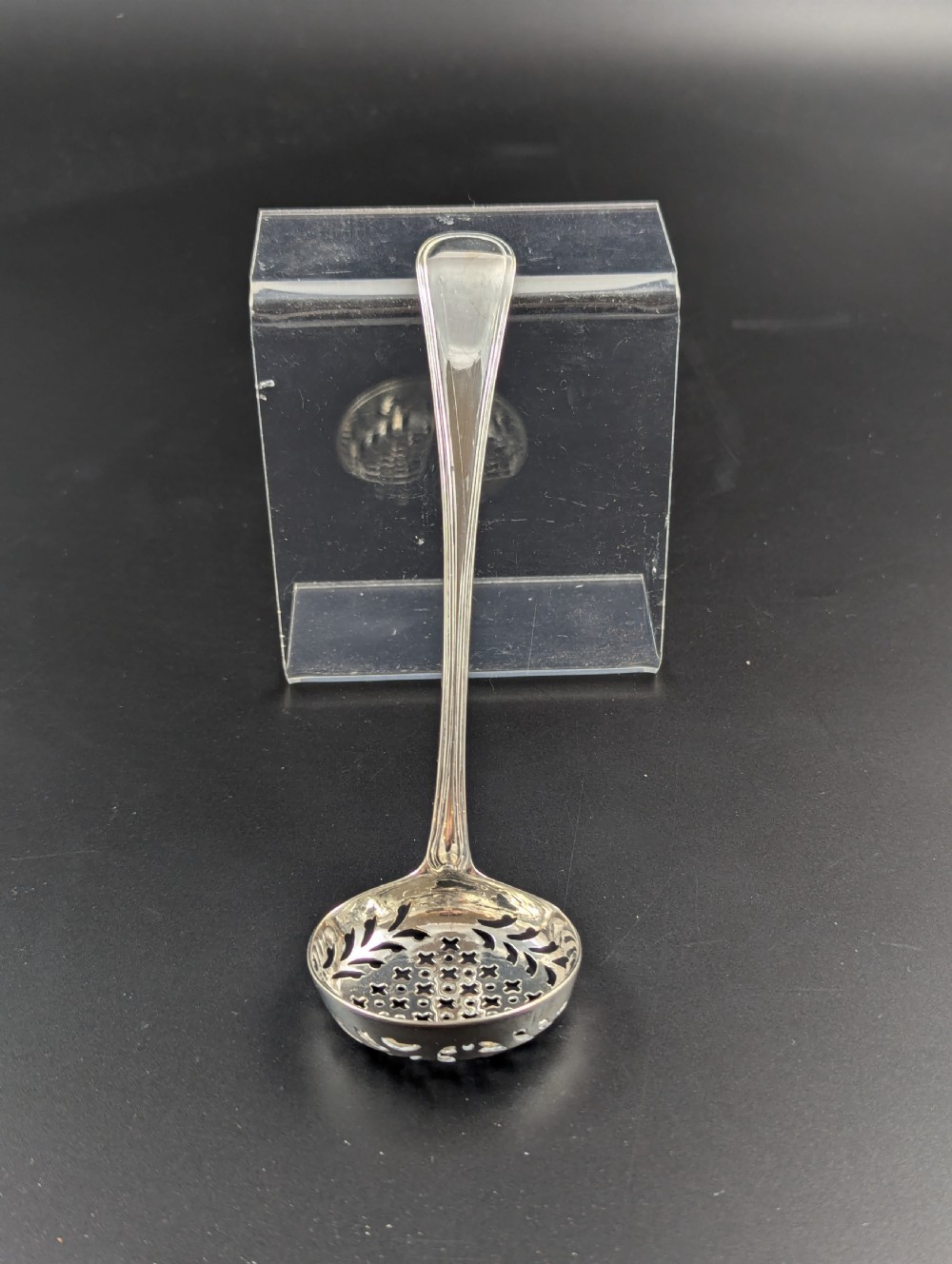 A George III Sterling Silver Sugar Sifter Spoon, Mark of John Lambe, London, circa 1789 View VII