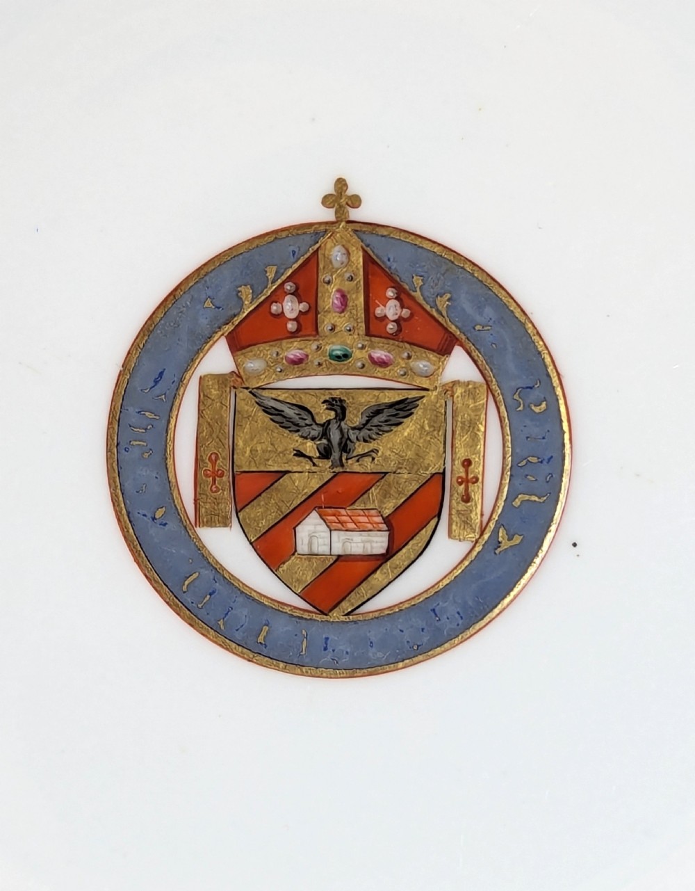 A pair of Victorian Minton porcelain cabinet plates featuring turquoise rims with gilt details, floral cartouches, and a central painted coat of arms. View XV