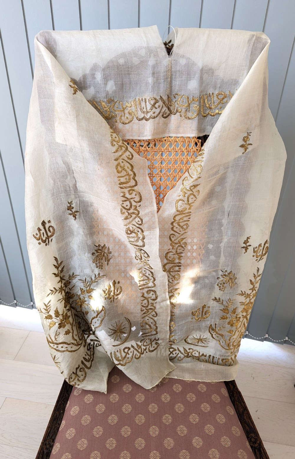 A light cream silk scarf featuring metallic gold thread hand embroidery with floral motifs, crescent symbols, and calligraphic borders. View II