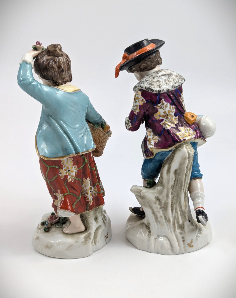 A pair of 19th-century Samson polychrome porcelain figurines depicting allegorical seasonal figures on naturalistic bases. View III