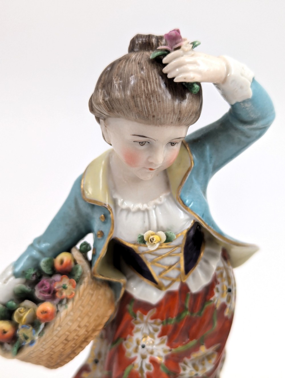 A pair of 19th-century Samson polychrome porcelain figurines depicting allegorical seasonal figures on naturalistic bases. View VII