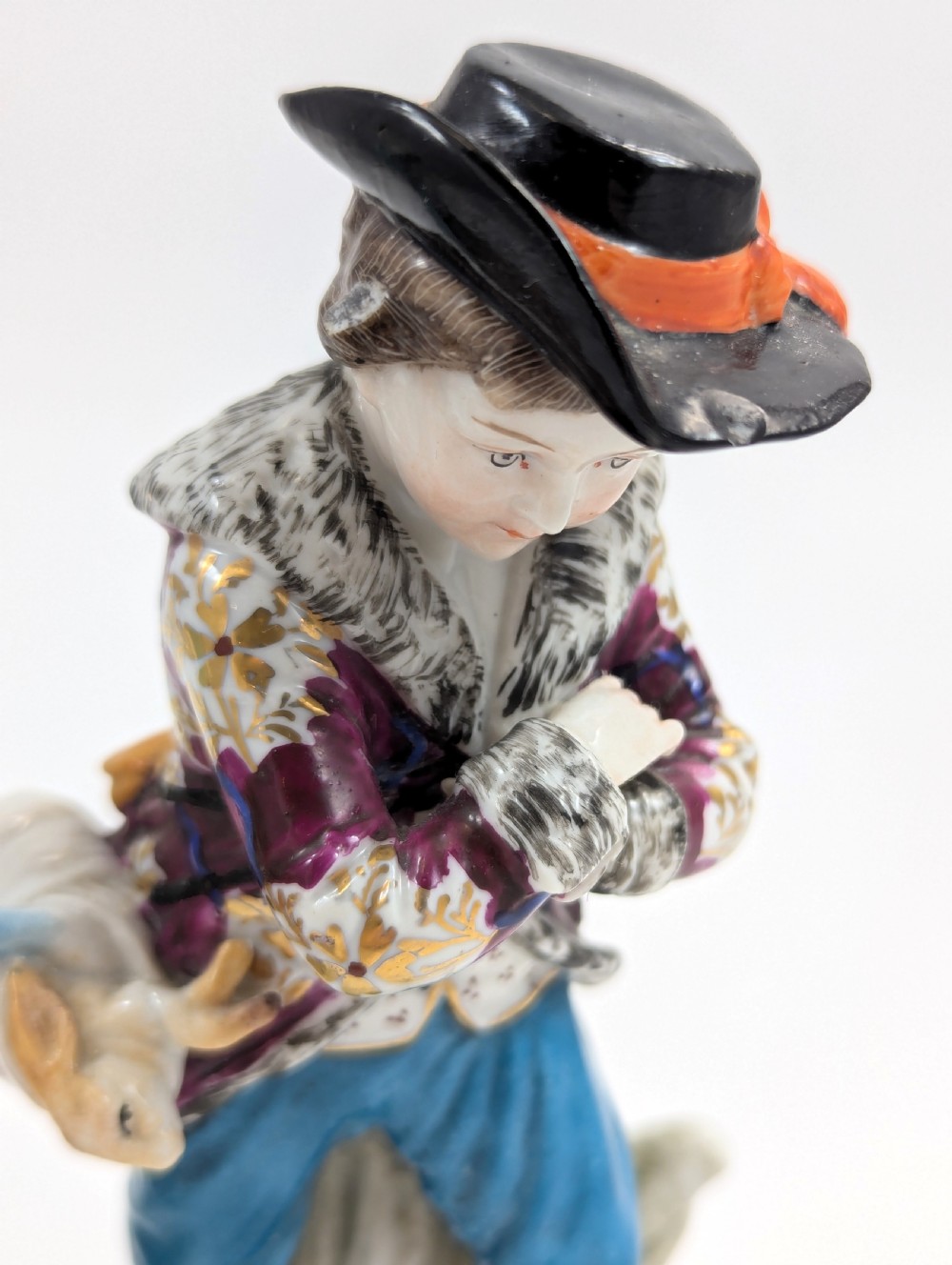 A pair of 19th-century Samson polychrome porcelain figurines depicting allegorical seasonal figures on naturalistic bases. View VIII
