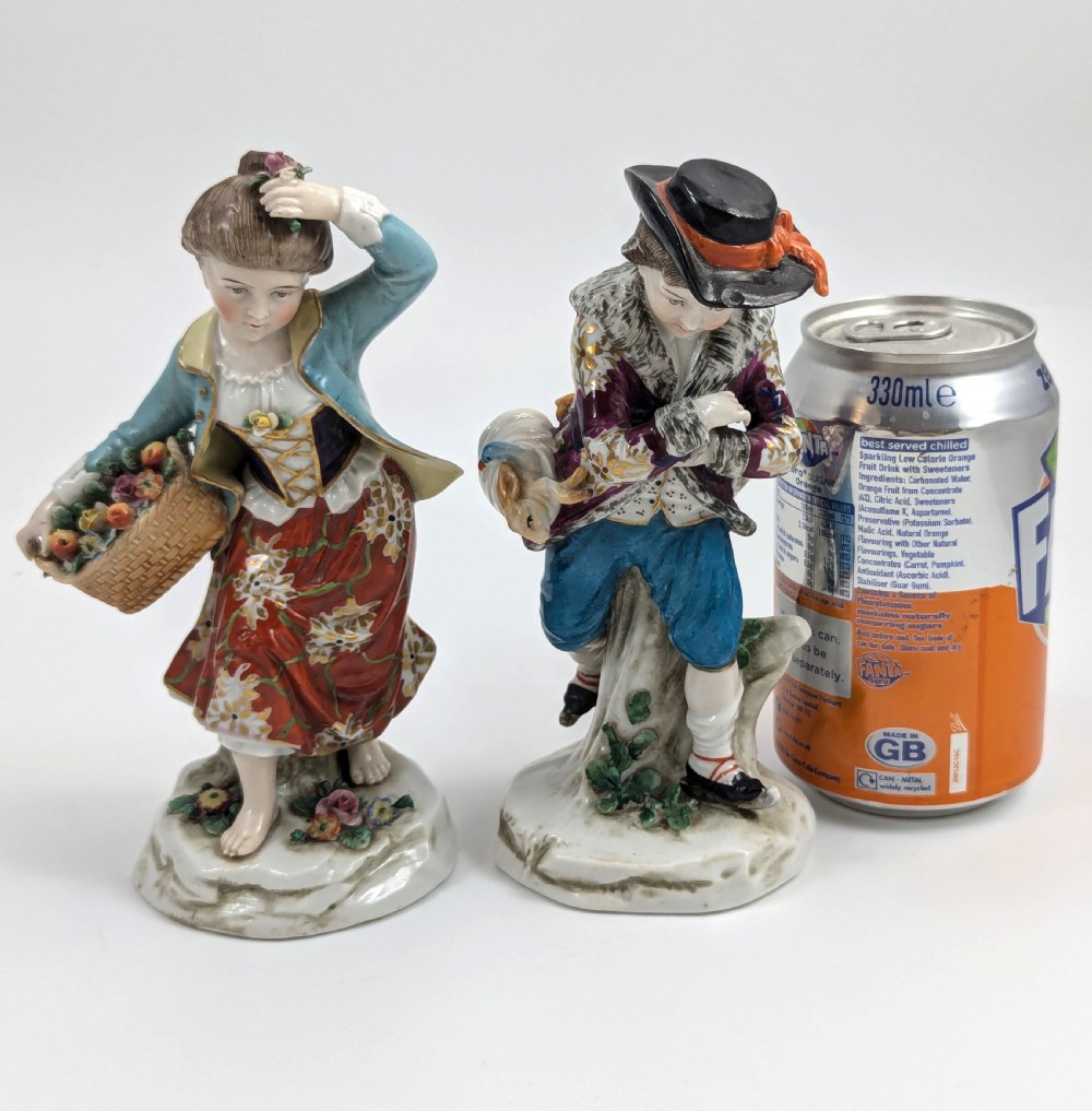 A pair of 19th-century Samson polychrome porcelain figurines depicting allegorical seasonal figures on naturalistic bases. View IX