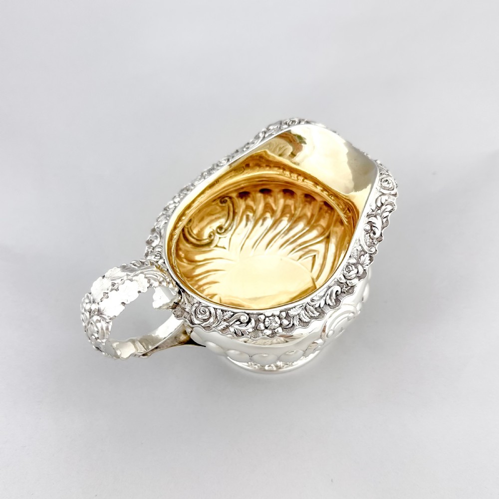 George IV Scottish sterling silver sugar basin and milk jug, gilt interior, embossed floral design, Charles Bendy, Edinburgh, 1822 View XVIII