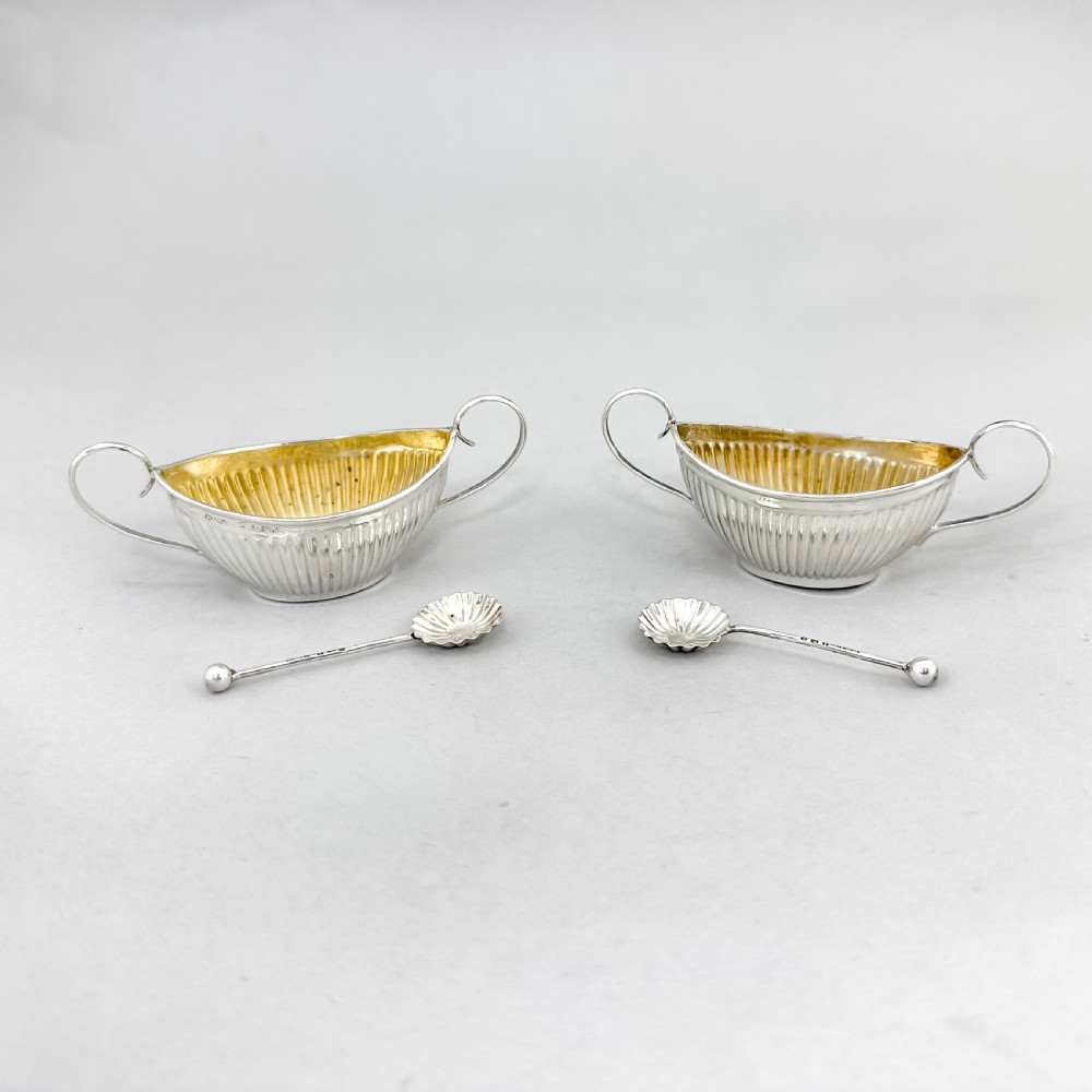 Pair of antique gilt sterling silver boxed navette salts with shell spoons, 1900 View V