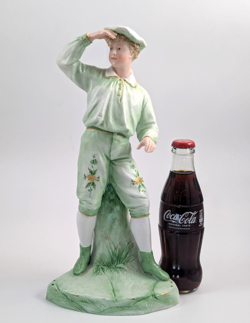 Gebrüder Heubach biscuit porcelain figurine of a young boy, c. 1885 View XI