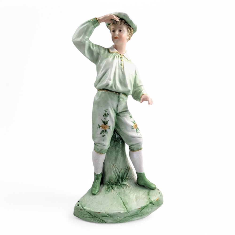 Gebrüder Heubach biscuit porcelain figurine of a young boy, c. 1885
