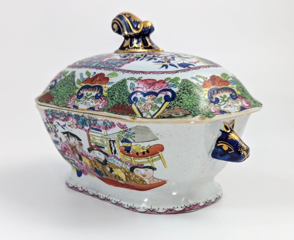 A Regency Masons ironstone tureen decorated in the Green Mandarin chinoiserie pattern with cobalt blue handles and a gilded scrolling finial. View II