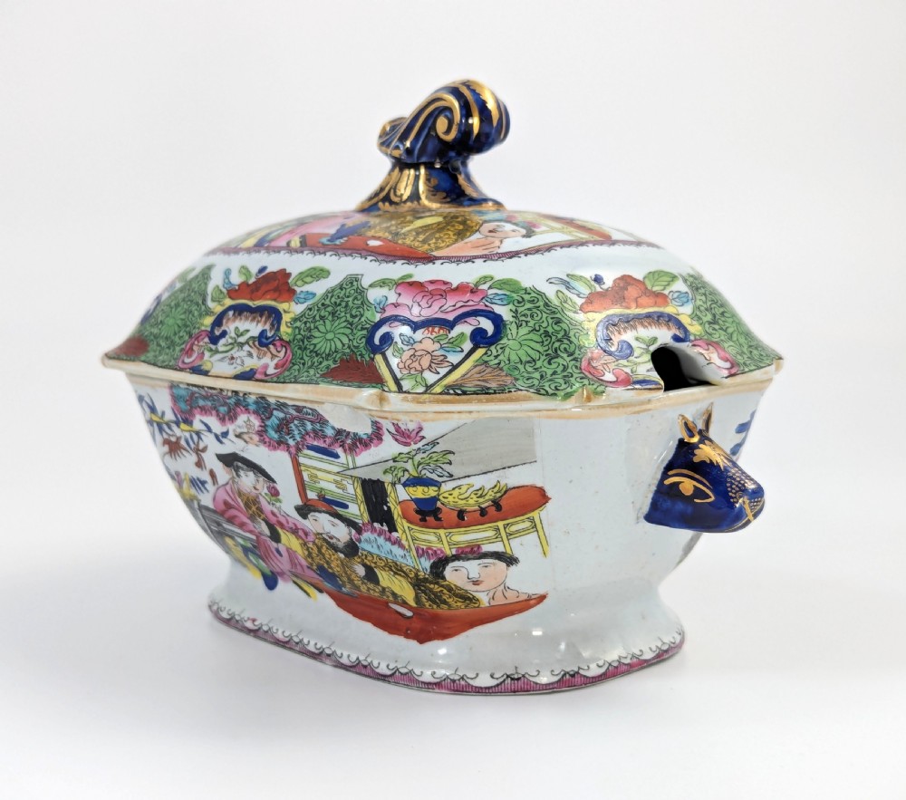 A Regency Masons ironstone tureen decorated in the Green Mandarin chinoiserie pattern with cobalt blue handles and a gilded scrolling finial. View VI