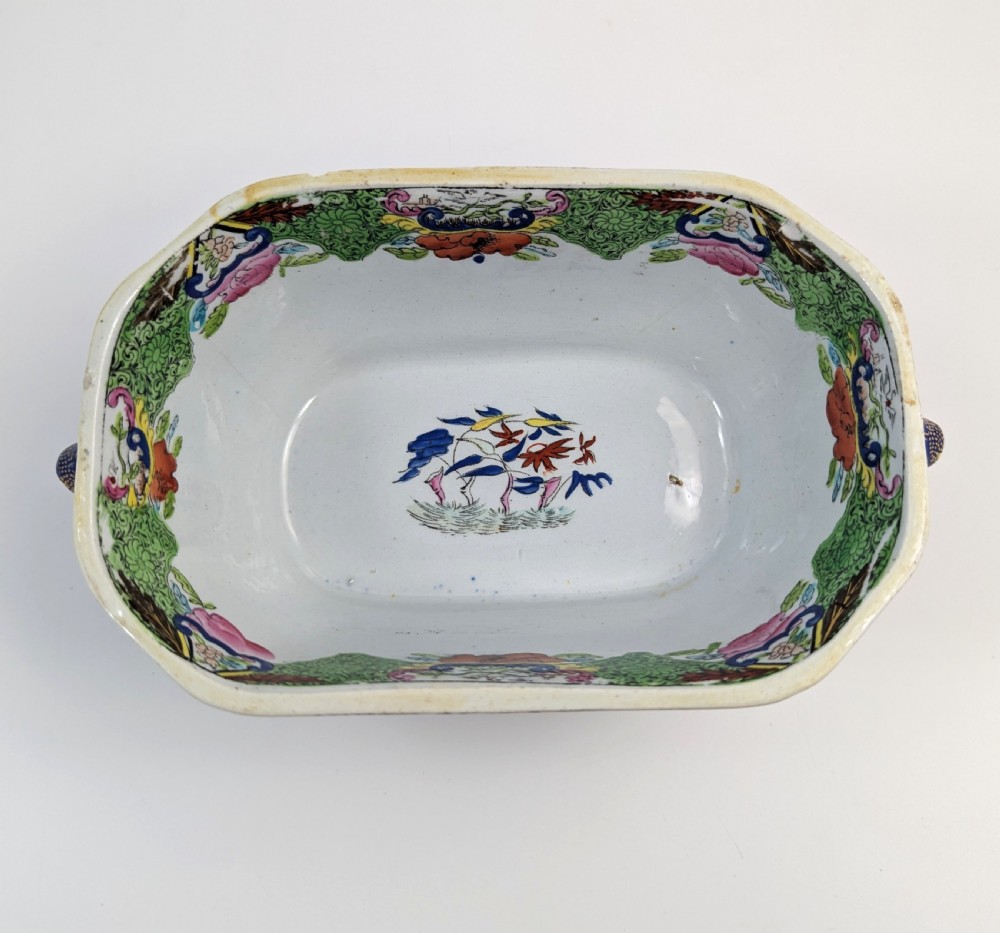 A Regency Masons ironstone tureen decorated in the Green Mandarin chinoiserie pattern with cobalt blue handles and a gilded scrolling finial. View IX
