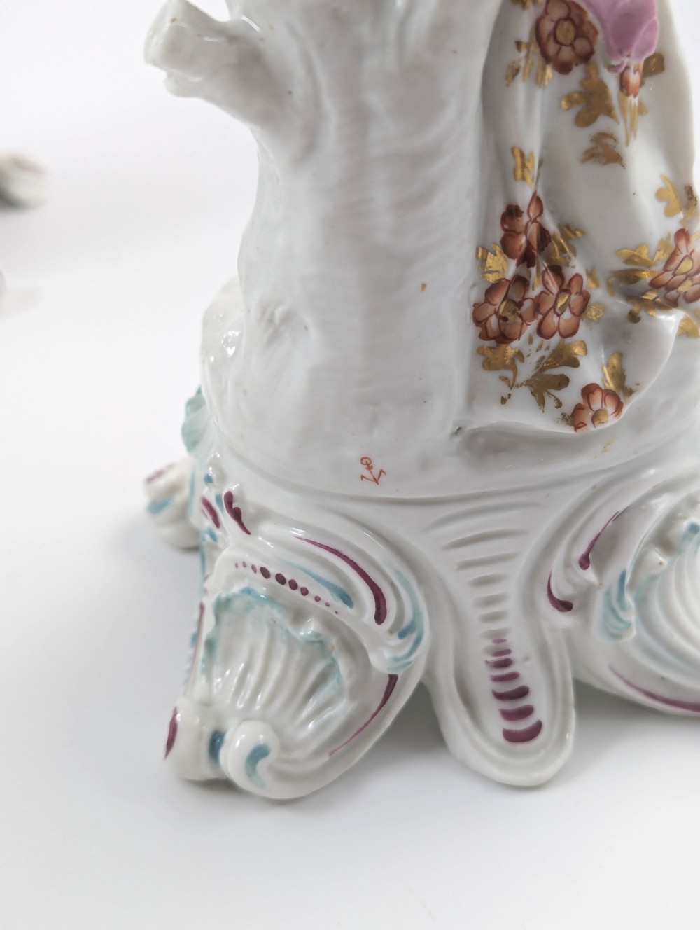 A pair of 19th-century French Samson polychrome porcelain allegorical figures standing on pierced Rococo scroll pedestals. View VI