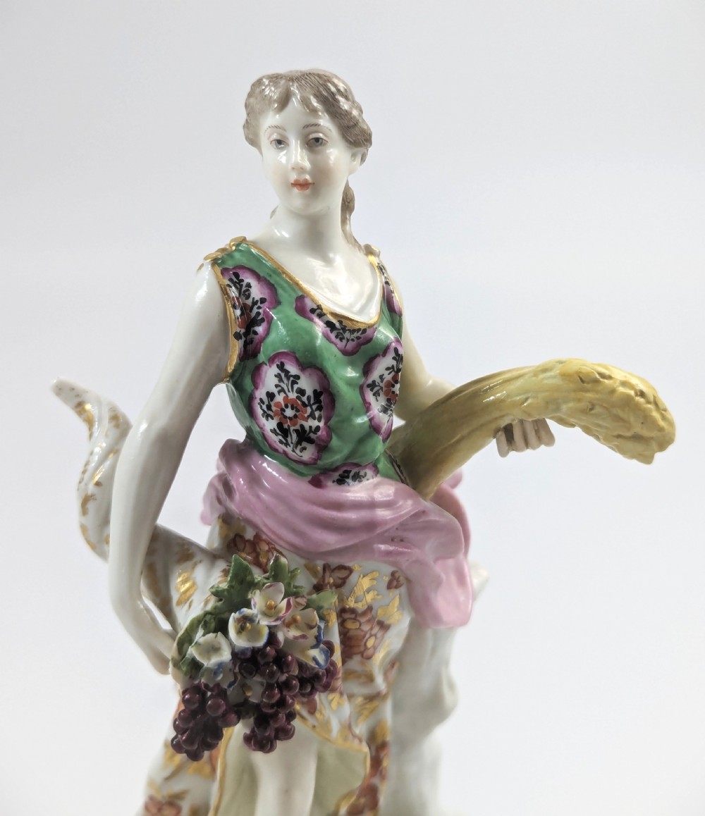 A pair of 19th-century French Samson polychrome porcelain allegorical figures standing on pierced Rococo scroll pedestals. View XI