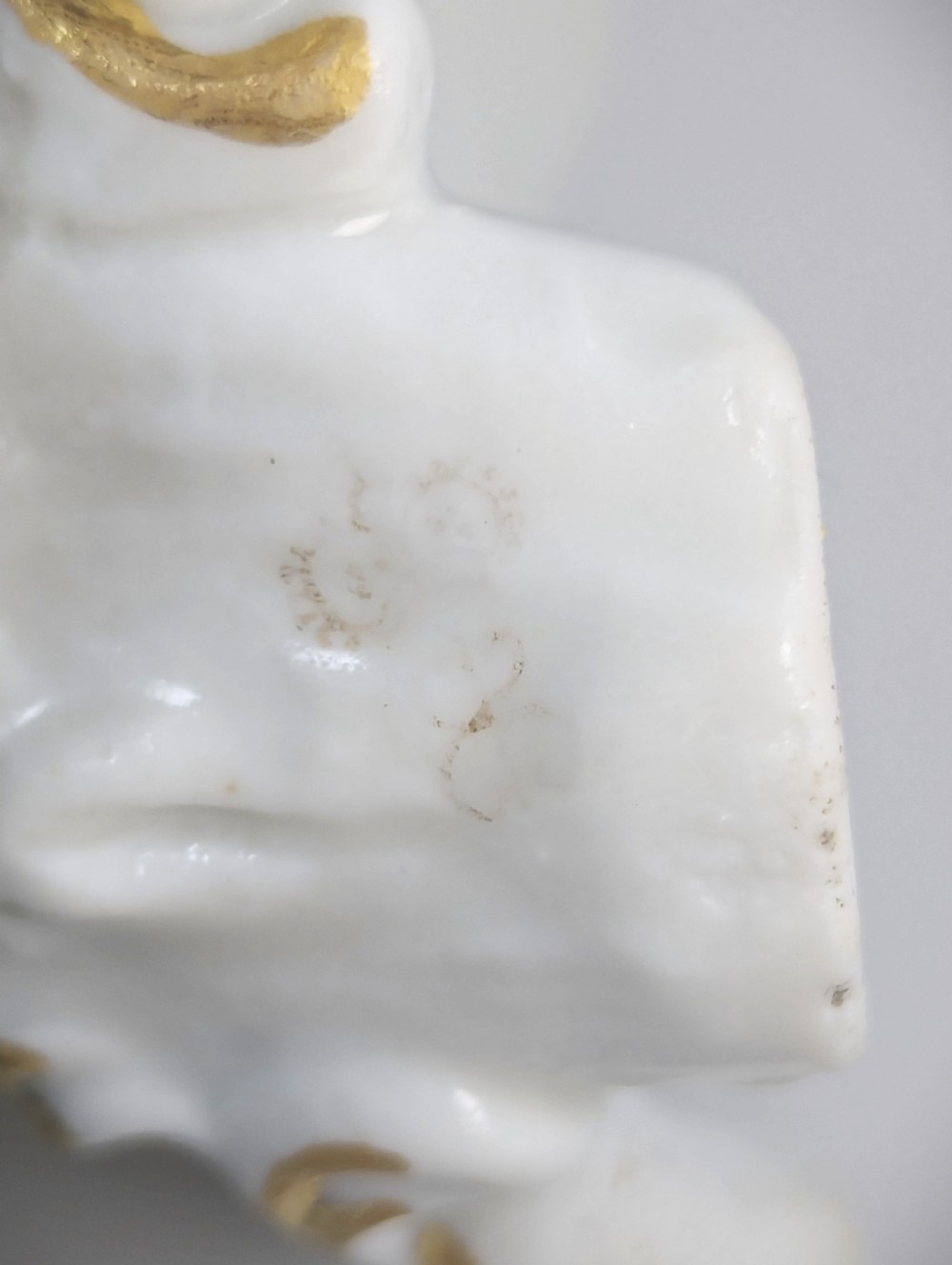 Pair of nineteenth-century Dresden porcelain figurines depicting a male bagpipe player with a dog and a female lute player with a lamb, both styled in Rococo attire on ornate bases. View VIII
