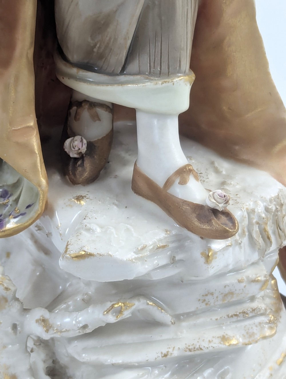 An Art Nouveau porcelain figurine depicting a standing maiden wrapped in a flowing scarf with a sage green dress on a naturalistic base. View XI