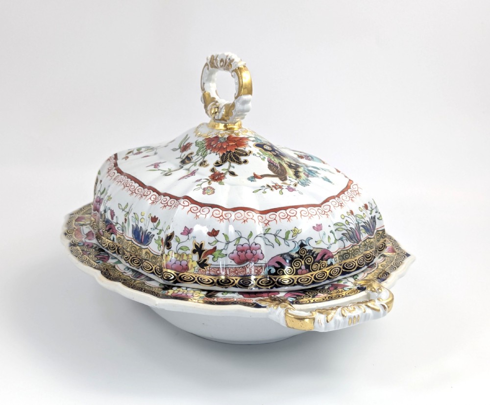 An antique Masons ironstone covered tureen with hand-painted polychrome Chinoiserie floral patterns, loop side handles, and a gilded handle on the lid. View V
