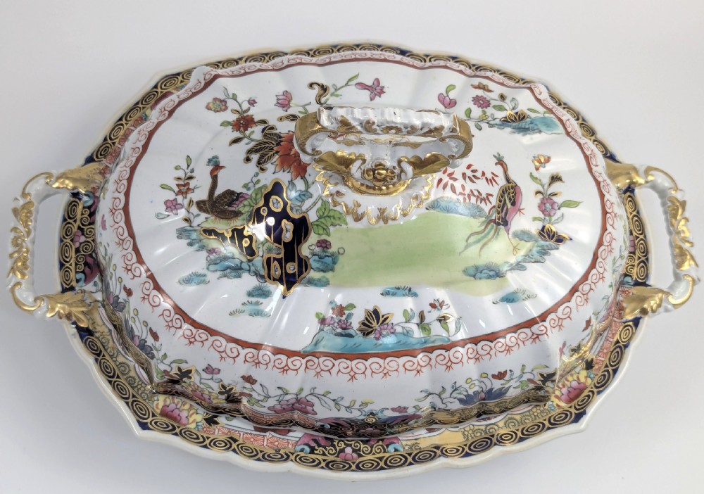 An antique Masons ironstone covered tureen with hand-painted polychrome Chinoiserie floral patterns, loop side handles, and a gilded handle on the lid. View VIII