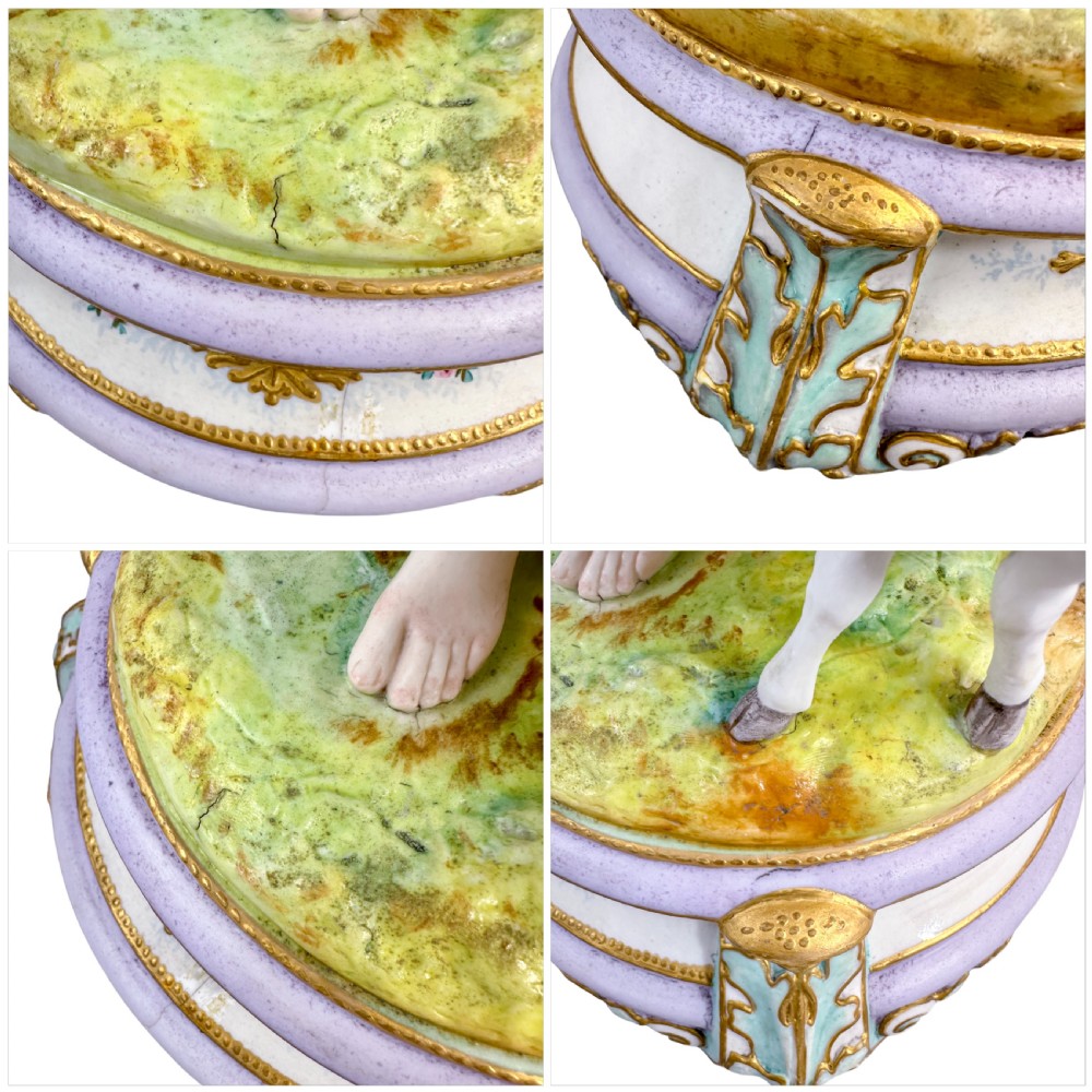 A pair of large French bisque porcelain sculptures featuring a shepherd and shepherdess with animals on gilded bases. View XII