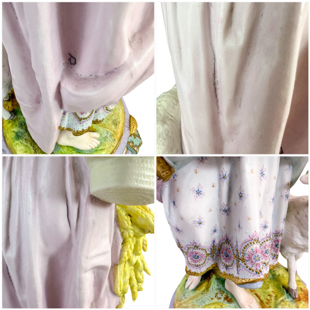 A pair of large French bisque porcelain sculptures featuring a shepherd and shepherdess with animals on gilded bases. View XIII