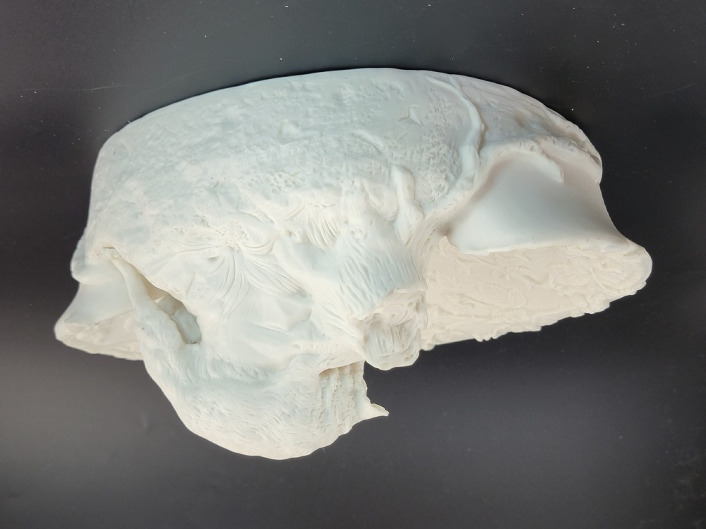 An off-white Parian porcelain centrepiece dish featuring a sculpted fox perched on a central stump above a rabbit in a hollow base surrounded by leaves. View IV