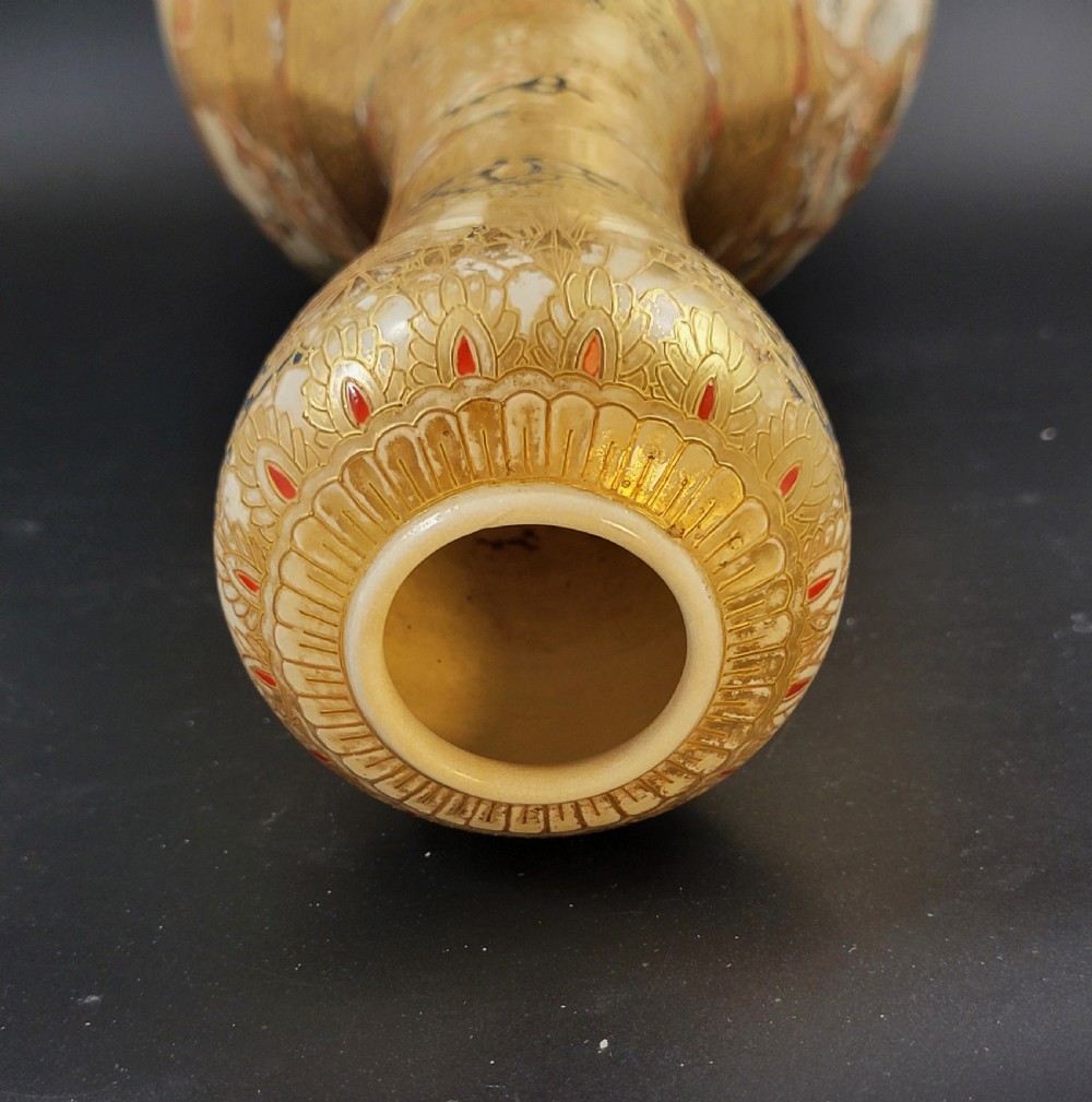 A Japanese Satsuma earthenware vase featuring a bulbous garlic-shaped mouth, intricate gilded borders, and painted panels depicting samurai warriors. View XII