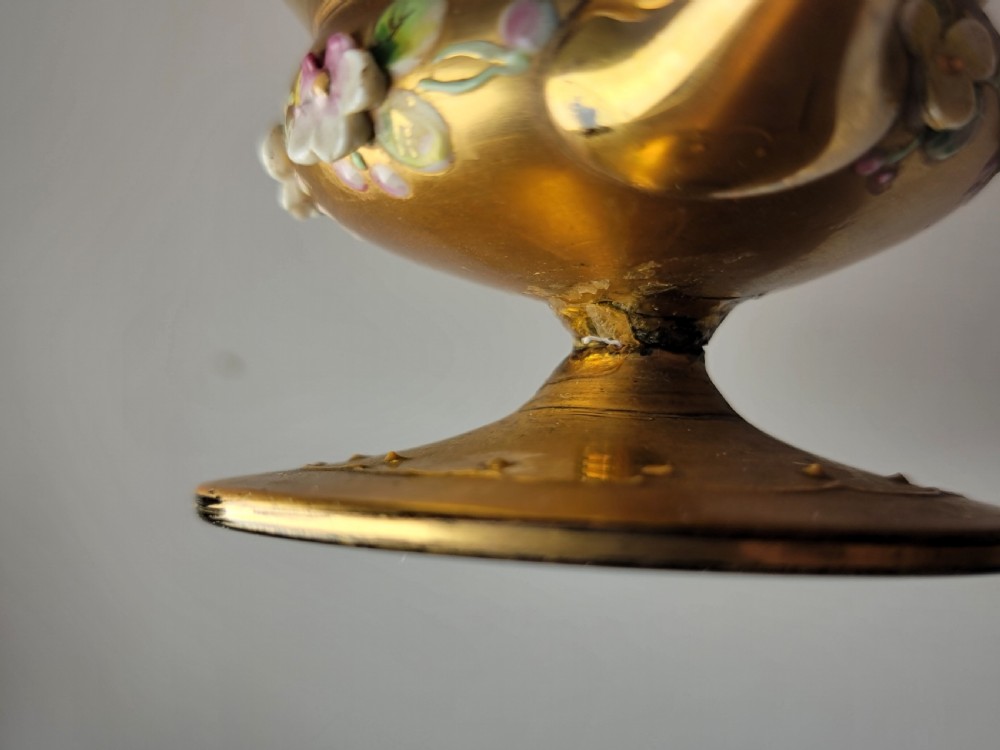 A set of six late nineteenth-century cobalt blue Bohemian glass tea cups and saucers featuring heavy gold gilding and raised enamel floral decoration. View XVII