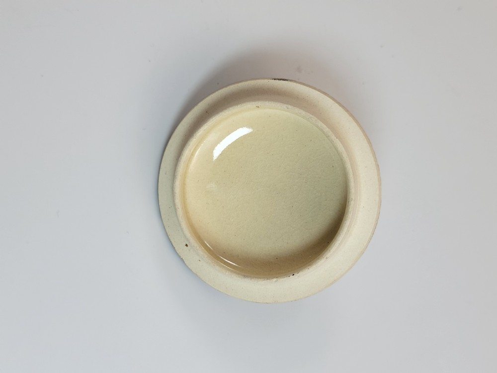 A lidded Japanese Satsuma ceramic sugar bowl with two gilt handles, crackle glaze, and hand-painted figures in a landscape. View XI