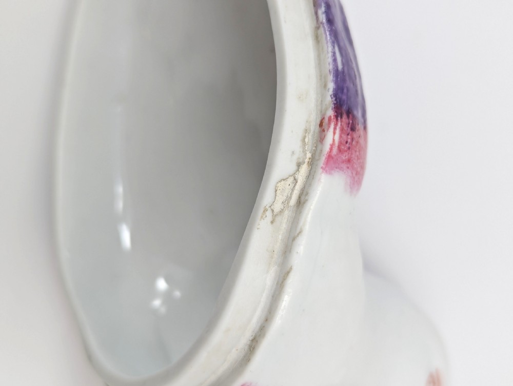 A late nineteenth-century Imperial Russian porcelain butter dish shaped as a seated bird with pink, purple, and blue stippled decoration. View VII