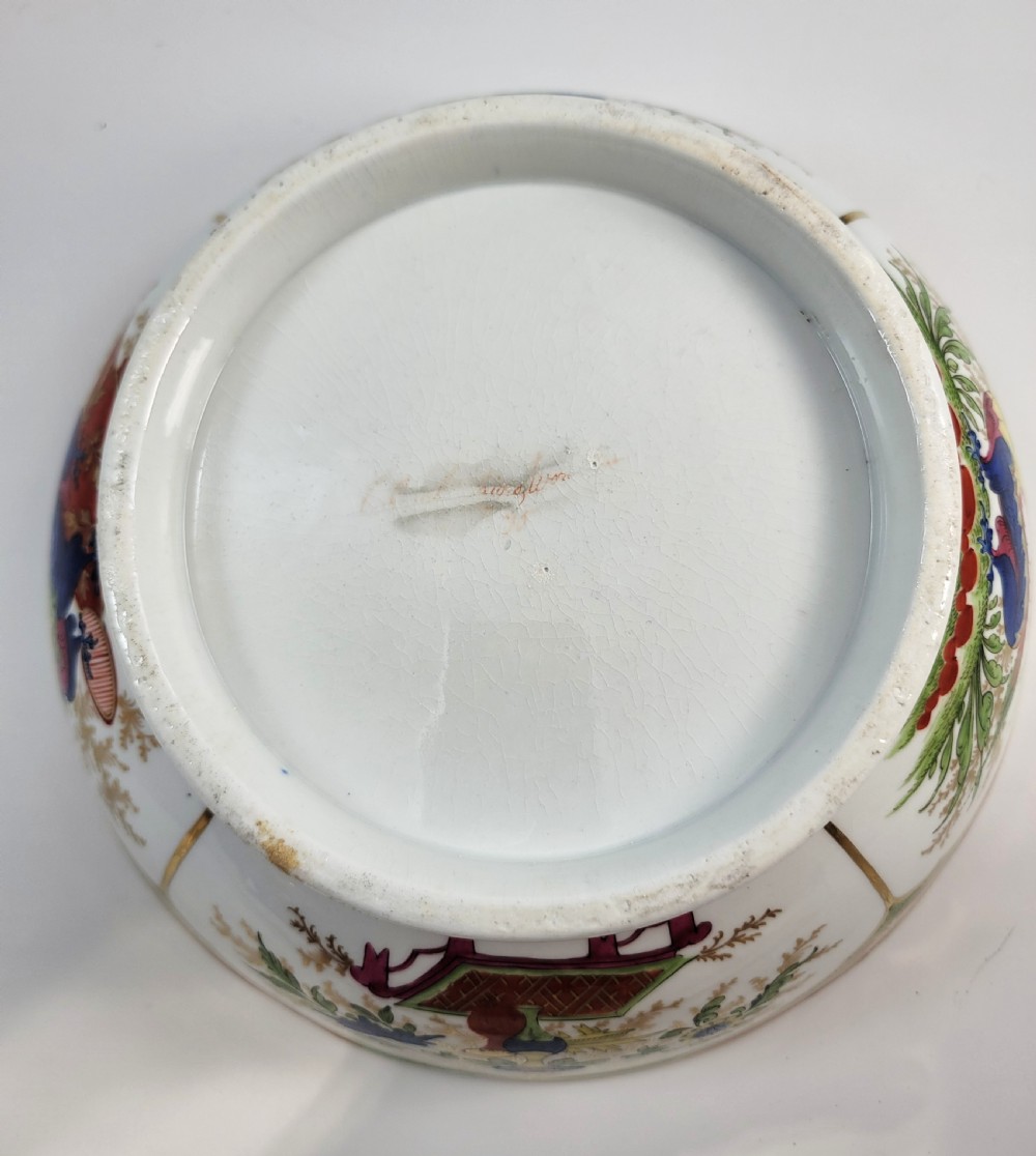 A Regency Chamberlain Worcester porcelain bowl with scalloped edges and colourful Chinoiserie enamel painting, resting on a carved dark mahogany stand. View XIII