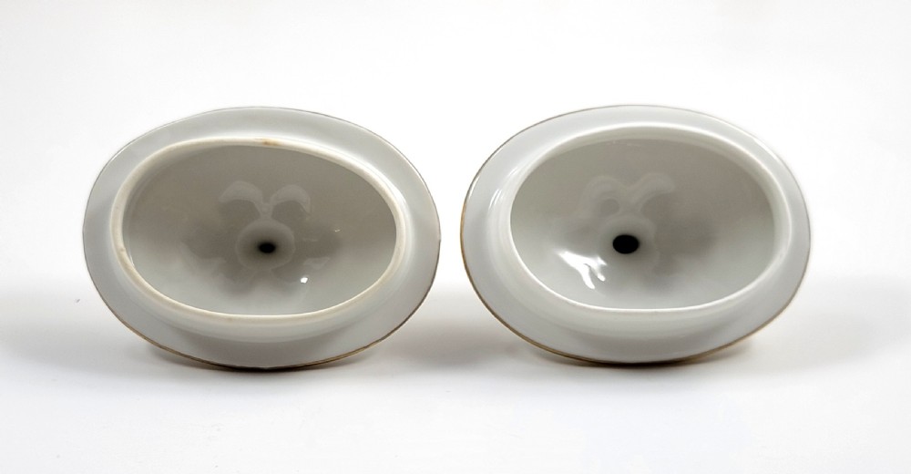 A three-piece white porcelain coffee set featuring a pot, sugar bowl, and cream jug with fluted bodies and gilded acanthus leaf detailing. View XI