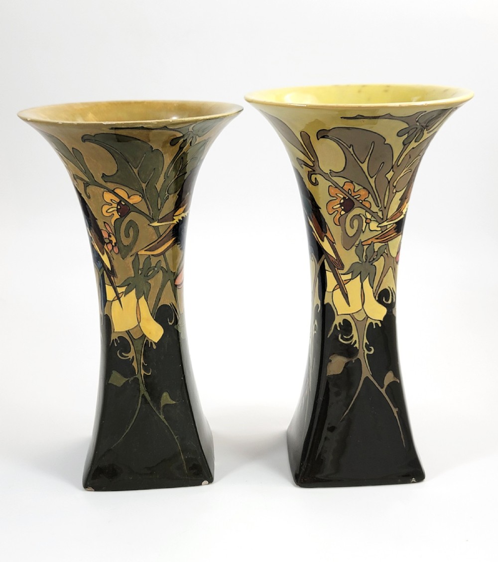 A pair of flared Art Nouveau porcelain vases featuring hand-painted birds perched on branches against a dark brown and yellow background. View IV