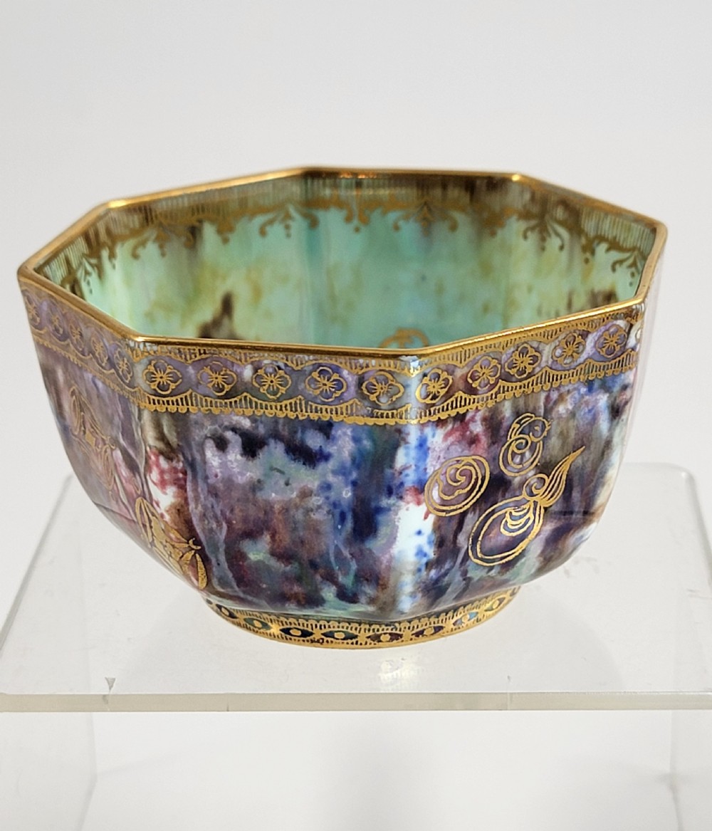 An octagonal antique Wedgwood lustre bowl featuring an iridescent purple exterior with gold gilded motifs and a pale green interior. View II