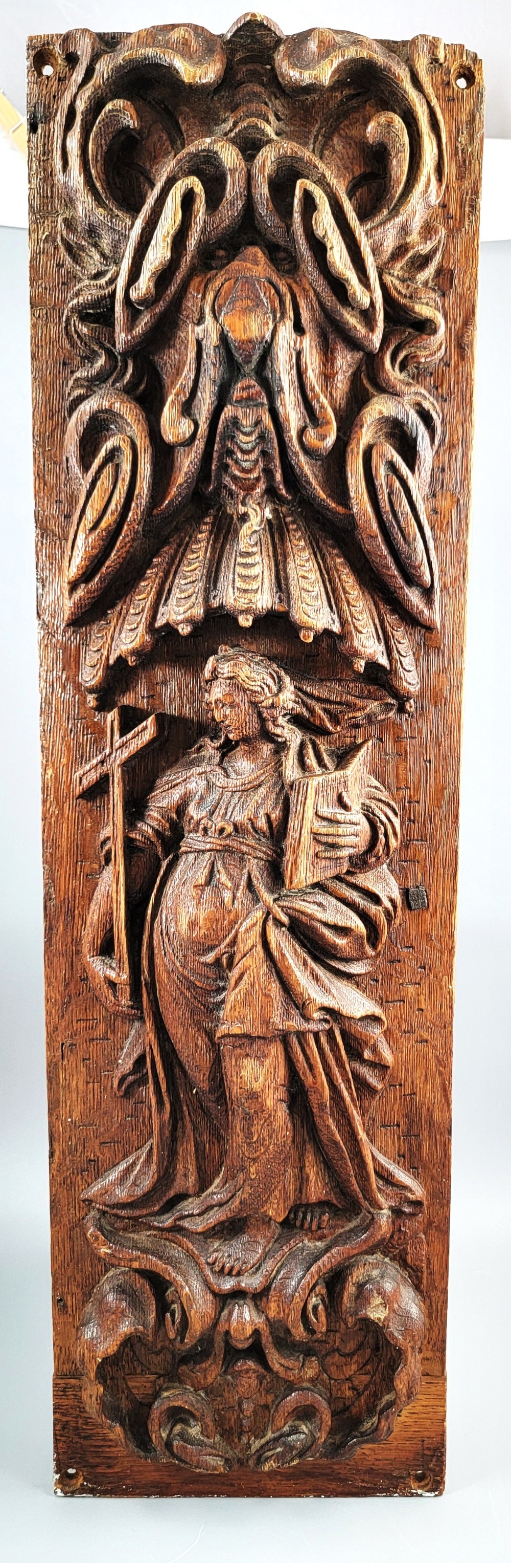 A Superb Antique Baroque Carved Oak Panel, Allegory of Faith, Flemish or German, circa 1680.