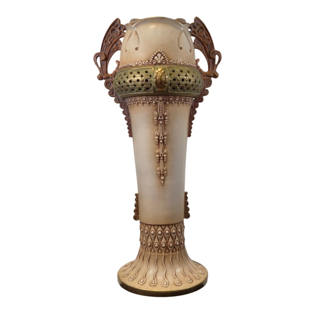 A tall Art Nouveau ceramic vase featuring a cream glaze body, brown reticulated handles, geometric relief beadwork, and a flared pedestal base. View III