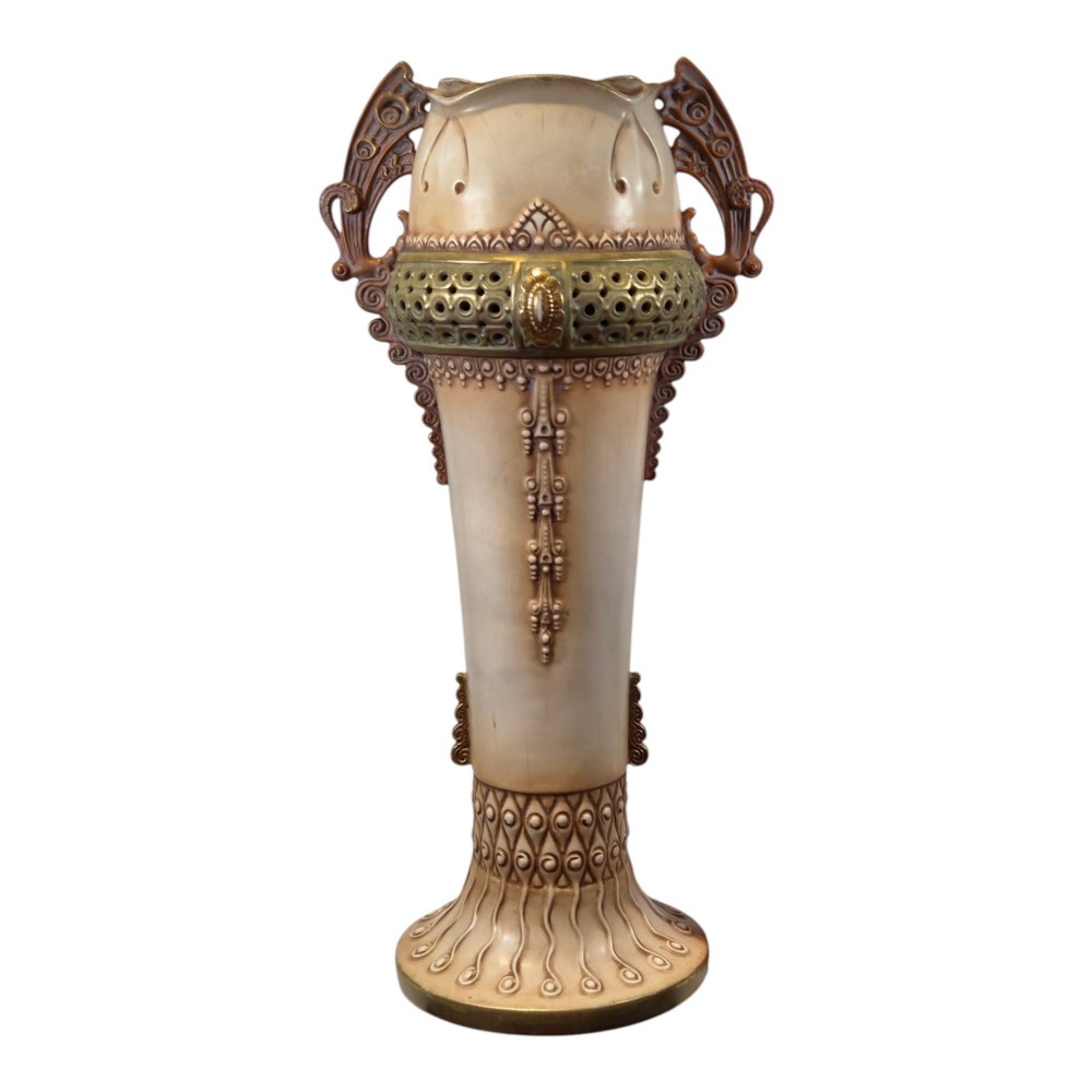A tall Art Nouveau ceramic vase featuring a cream glaze body, brown reticulated handles, geometric relief beadwork, and a flared pedestal base. View V