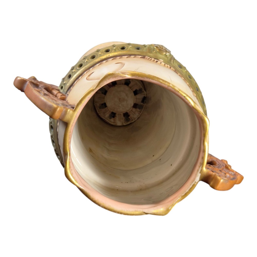 A tall Art Nouveau ceramic vase featuring a cream glaze body, brown reticulated handles, geometric relief beadwork, and a flared pedestal base. View VI