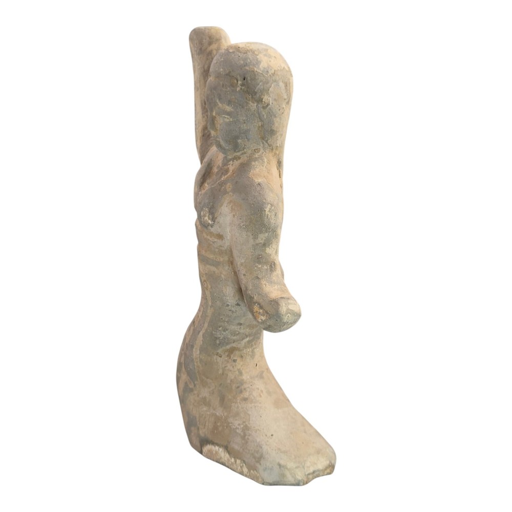 An ancient grey earthenware figure of a dancer in an S-shaped posture with one arm raised and an unglazed finish. View II