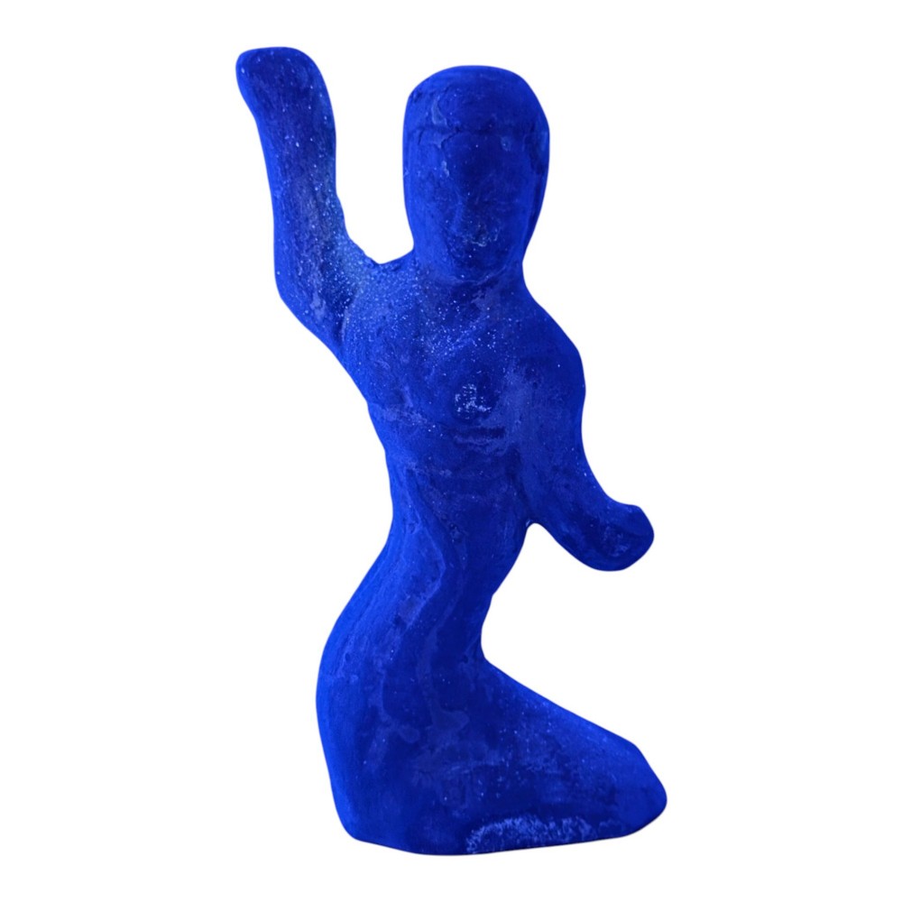 An ancient grey earthenware figure of a dancer in an S-shaped posture with one arm raised and an unglazed finish. View XI