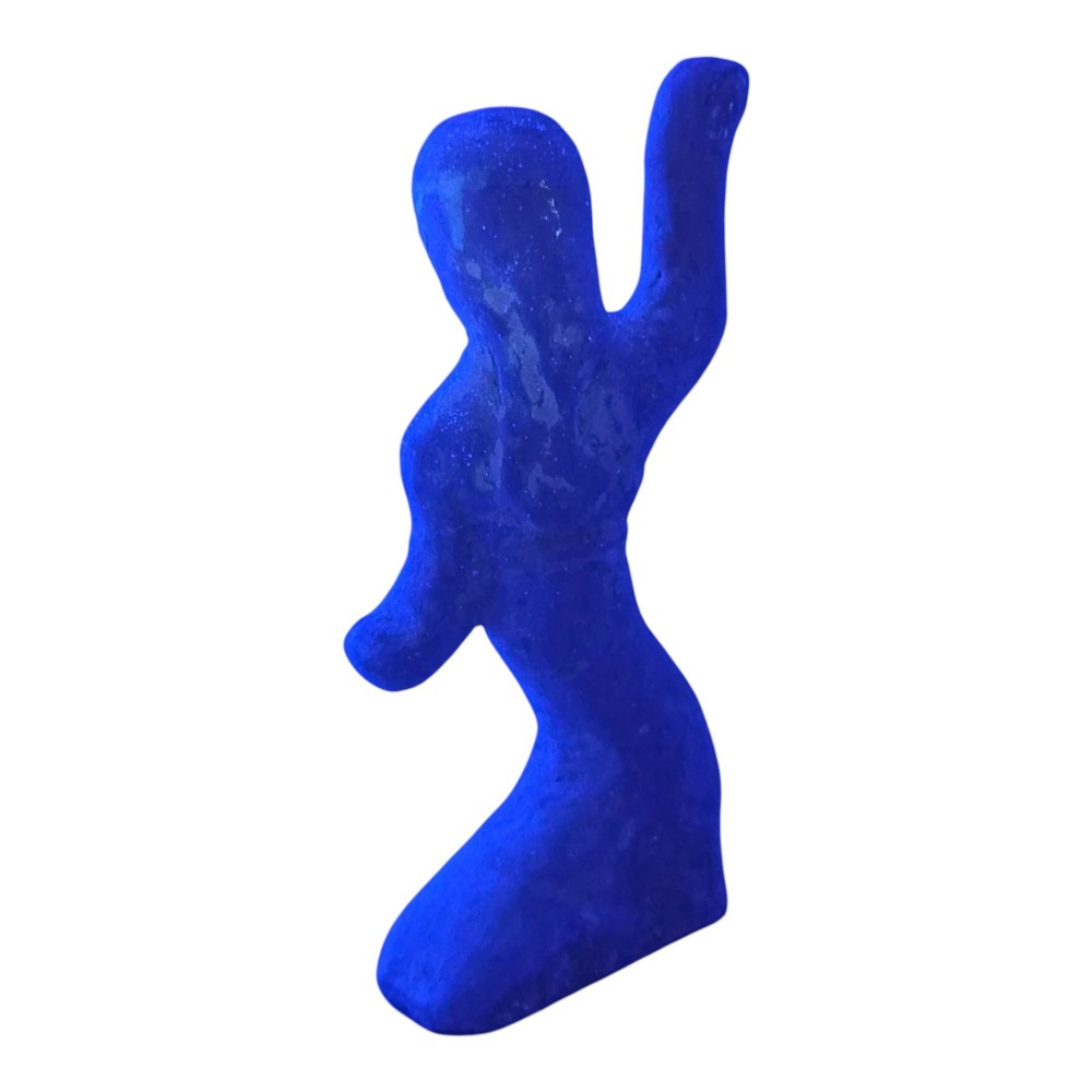 An ancient grey earthenware figure of a dancer in an S-shaped posture with one arm raised and an unglazed finish. View XIII