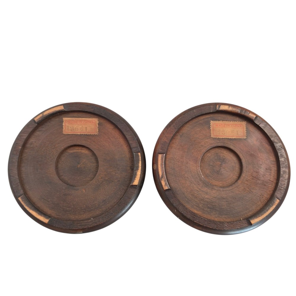 A pair of bulbous cream-coloured Japanese Satsuma earthenware vases decorated with gilt birds and autumnal foliage on dark carved wood stands. View VII