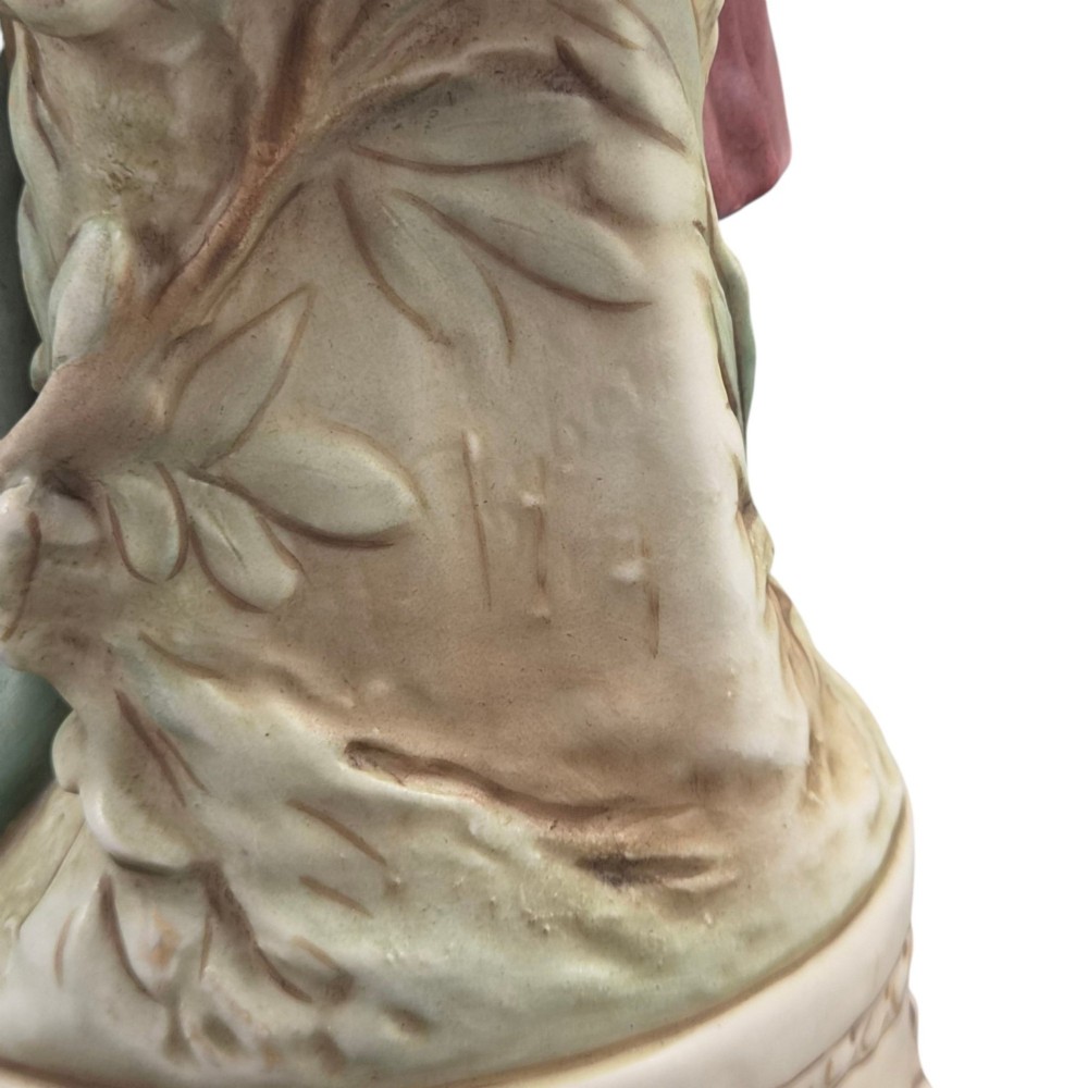 A pair of Royal Dux Art Nouveau porcelain figurines depicting classical maidens with winged cherubs and openwork baskets. View XI