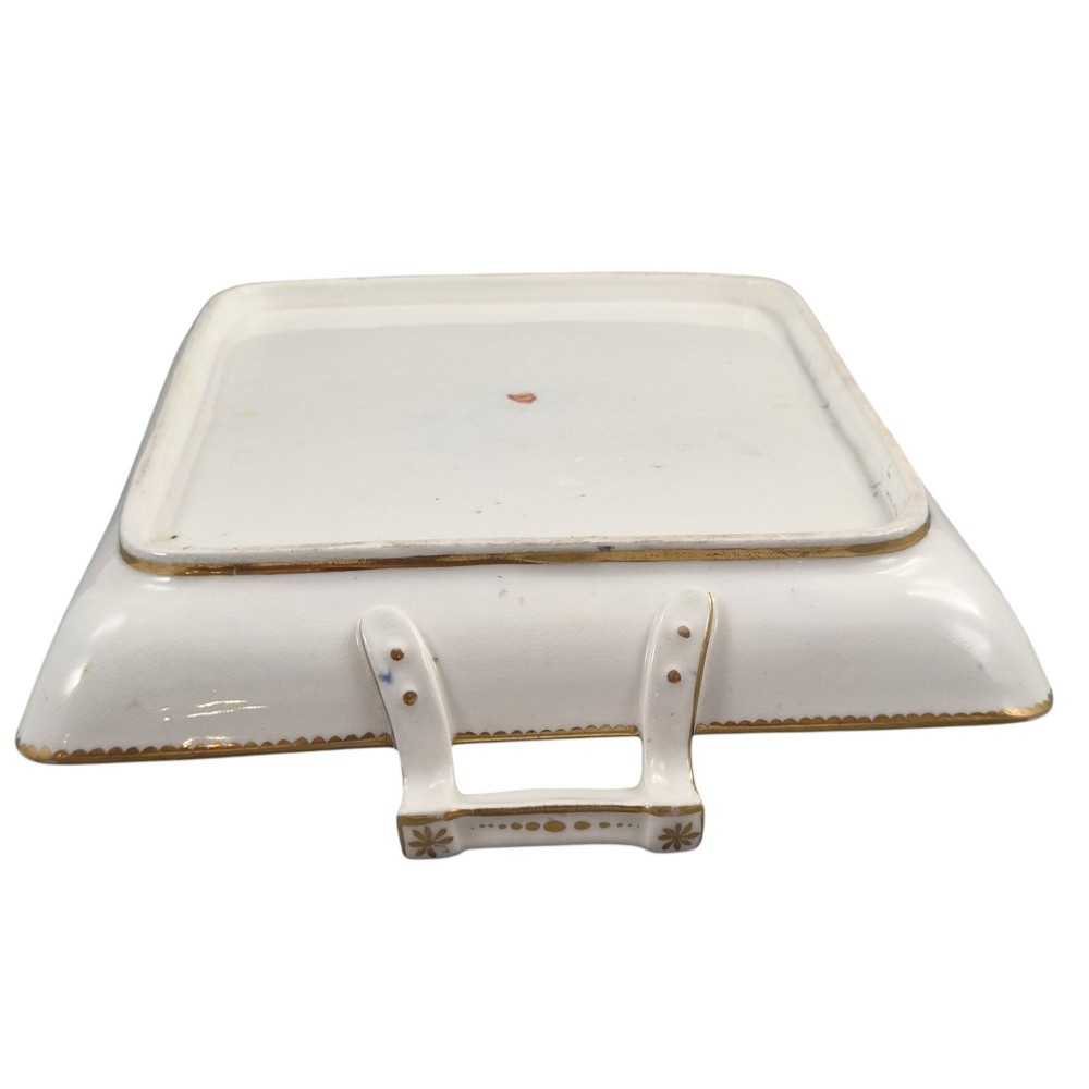 A rectangular mid-19th-century English porcelain tray featuring a dark cobalt blue ground, hand-painted exotic birds in a central oval vignette, floral reserves, and gilt handles. View VII