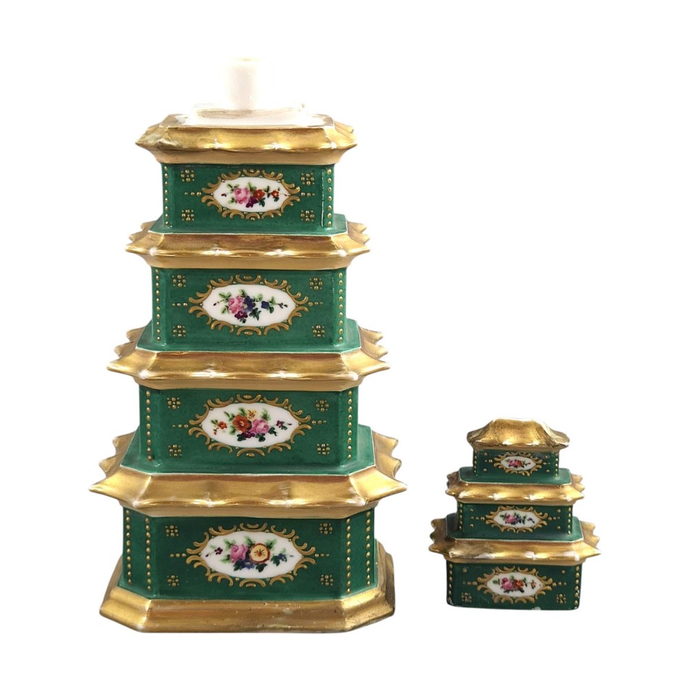A multi-tiered green and gold porcelain pagoda-shaped perfume bottle featuring hand-painted floral cartouches on each section. View VI